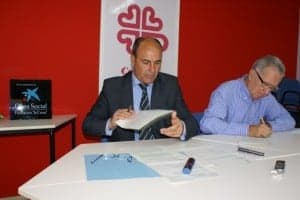 Firma del acuerdo entre La Caixa y Cáritas. 