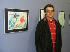 Juanfer Briones junto a su obra. Ángel Huguet.