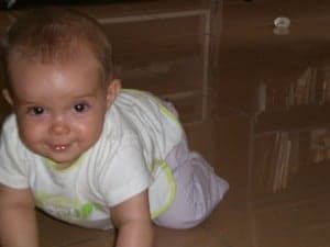 Contraportada no 26, imagen 1 ( Ana gateando a los 7 meses)