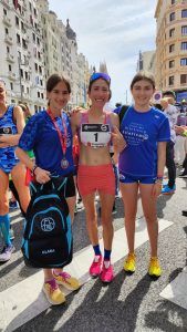 Con Antonella Palmisano, campeona olímpica en Tokio 2021 de los 20k km marcha .