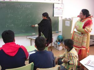 Inmigrantes en una clase de castellano. Foto S.E.